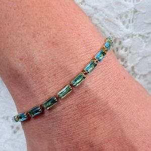 Oshena designer beachwear radiant faceted ocean blue Gold tennis Bracelet